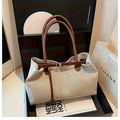 Selena canvas tote with tan handles